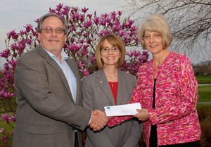 CENTERVILLE-WASHINGTON PARK DISTRICT - Carol Kennard and Bill Williams Washington Township Centerville Park District receiving grant for 1,000 for molded bucket seats for swing seats for disabled children at the park.